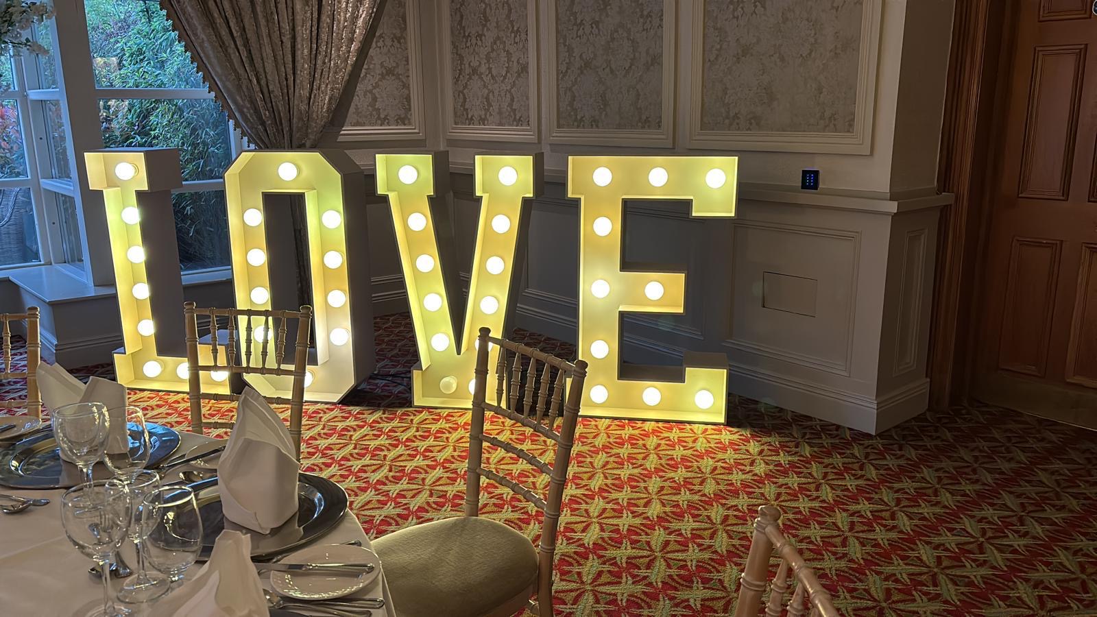 LOVE marquee letters with lights